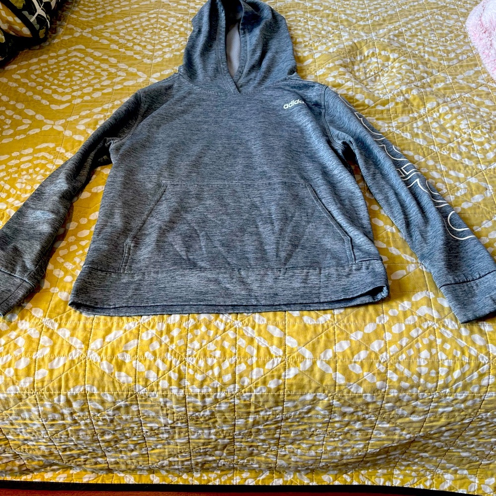 Adidas sweatshirt (no size tag) but fits a size 8 to 10 year old boy.